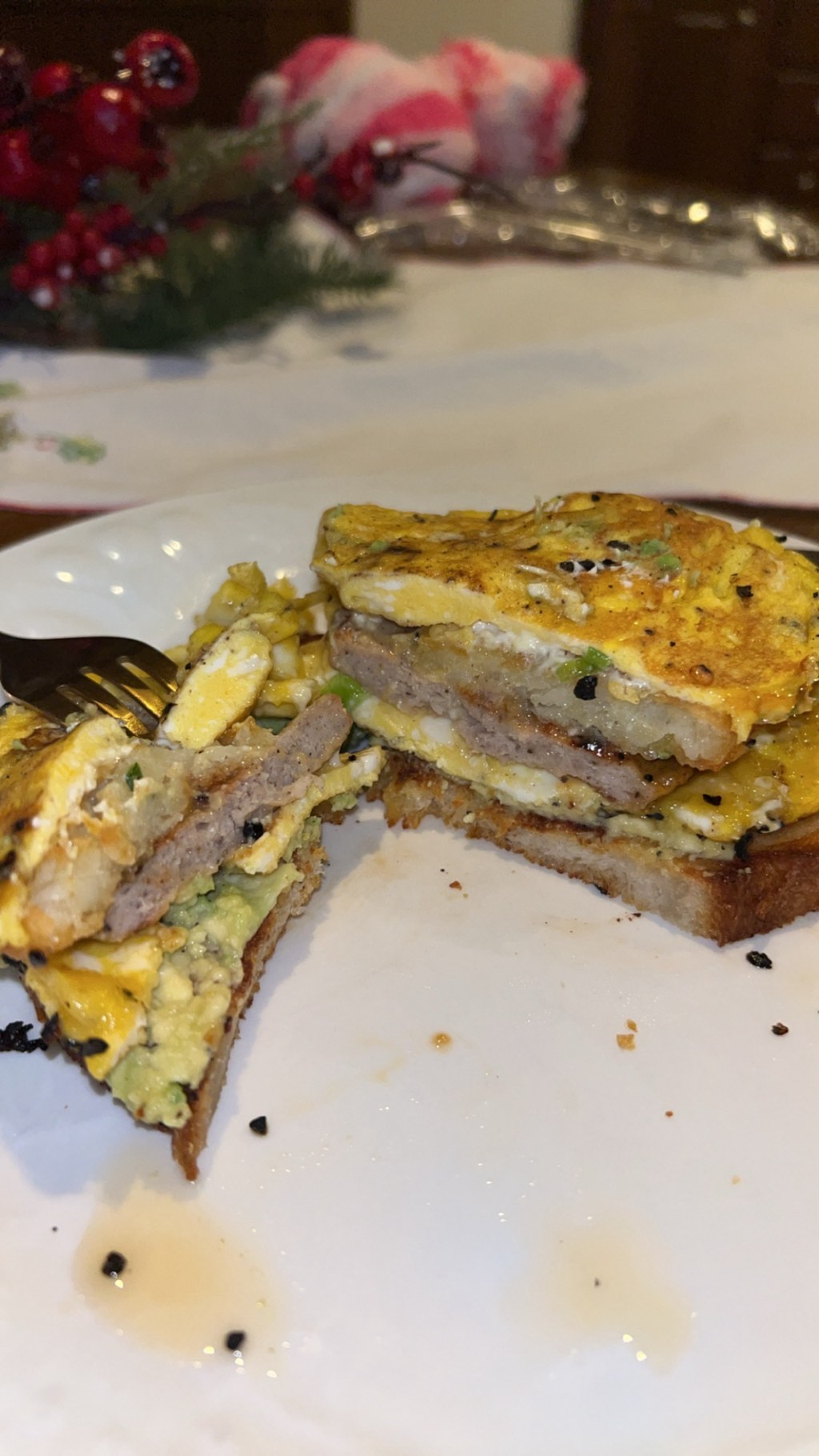 Loaded chili crunch avocado toast with sausage, egg, and hash&nbsp;brown